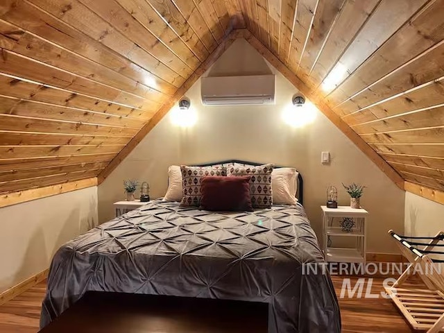bedroom with wooden ceiling, vaulted ceiling, a wall mounted air conditioner, and wood finished floors