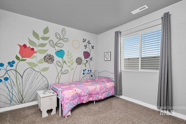 bedroom with visible vents, carpet floors, and baseboards