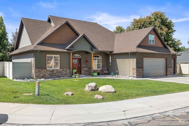 455 Coiner Cir, Twin Falls, ID 83301 - craftsman-style house featuring stone siding, concrete driveway, a shingled roof, and stucco siding