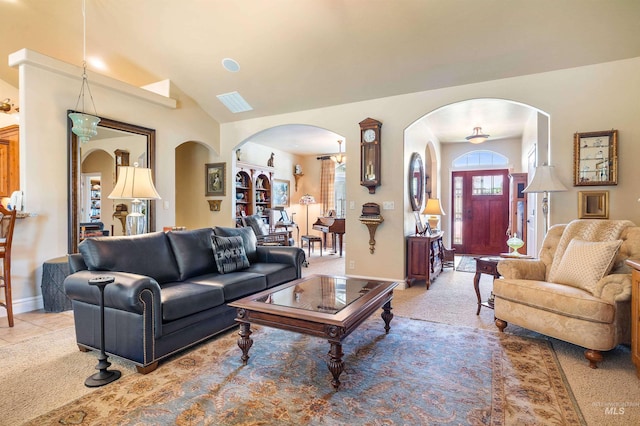 455 Coiner Cir, Twin Falls, ID 83301 - carpeted living area featuring arched walkways and lofted ceiling