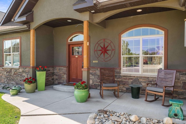 455 Coiner Cir, Twin Falls, ID 83301 - entrance to property featuring stone siding, stucco siding, and a porch