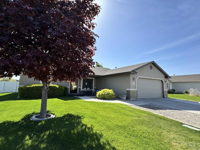 1309 Golden Pheasant Dr, Twin Falls, ID 83301 - view of front of home featuring an attached garage, concrete driveway, and a shingled roof