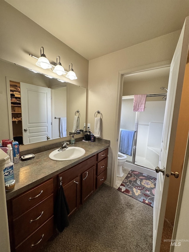 1309 Golden Pheasant Dr, Twin Falls, ID 83301 - bathroom with a stall shower, vanity, and toilet