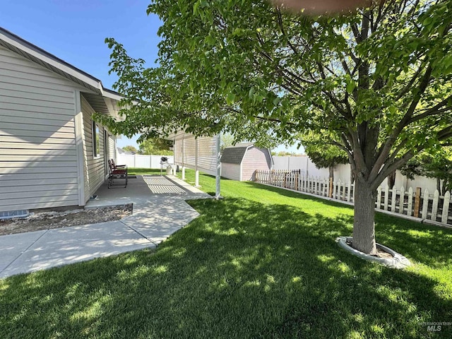 1309 Golden Pheasant Dr, Twin Falls, ID 83301 - view of yard with a shed, an outdoor structure, and a patio area