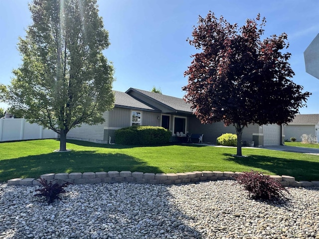 1309 Golden Pheasant Dr, Twin Falls, ID 83301 - view of front facade with a garage and roof with shingles