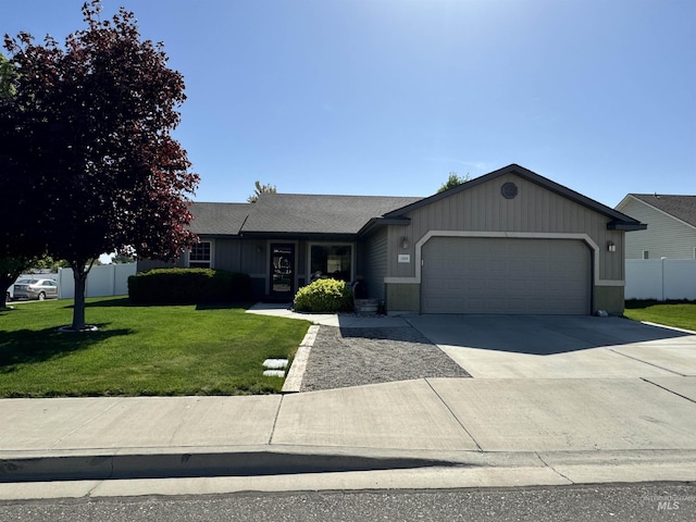 1309 Golden Pheasant Dr, Twin Falls, ID 83301 - ranch-style home featuring an attached garage and driveway