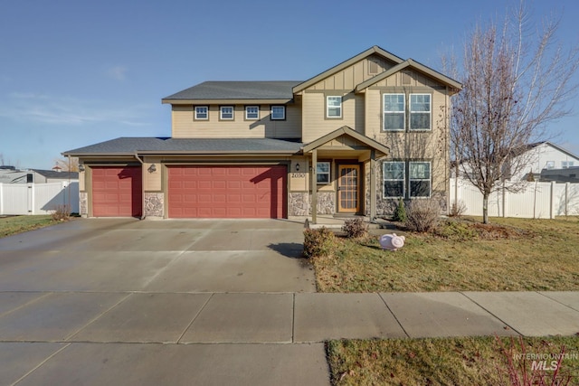 craftsman-style home featuring a garage