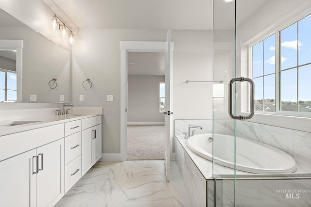 bathroom featuring a bath, baseboards, marble finish floor, vanity, and an enclosed shower