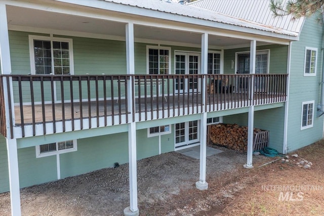 exterior space with metal roof and a porch