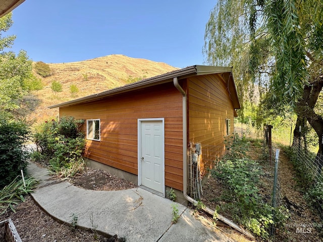 view of outdoor structure featuring a mountain view