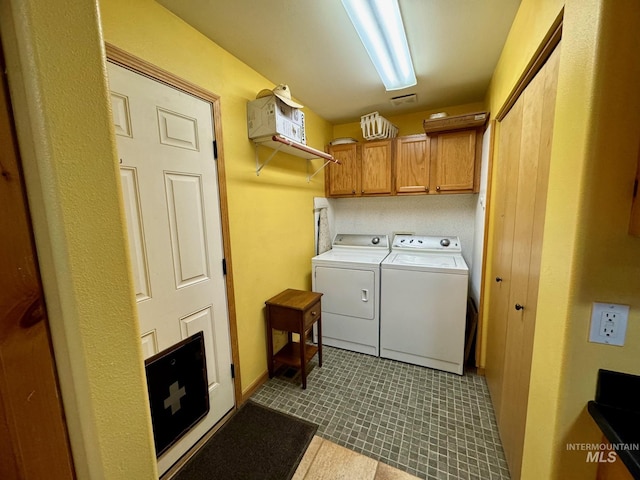 384 Race Creek Rd, Riggins, ID 83549 - laundry area featuring cabinet space and independent washer and dryer