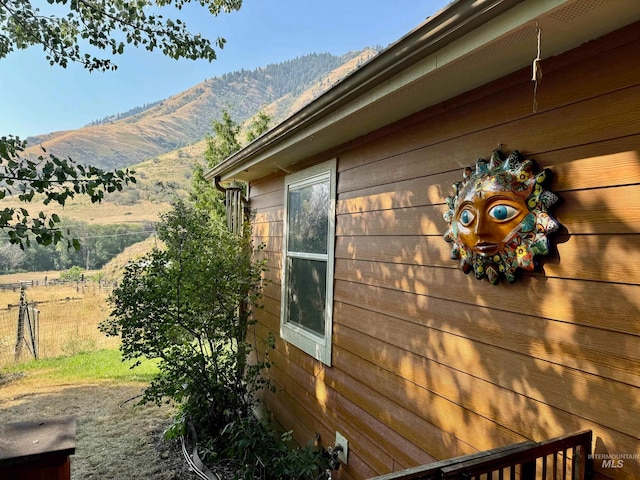 view of home's exterior featuring a mountain view