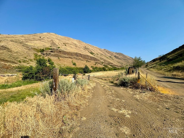 view of mountain feature with a rural view