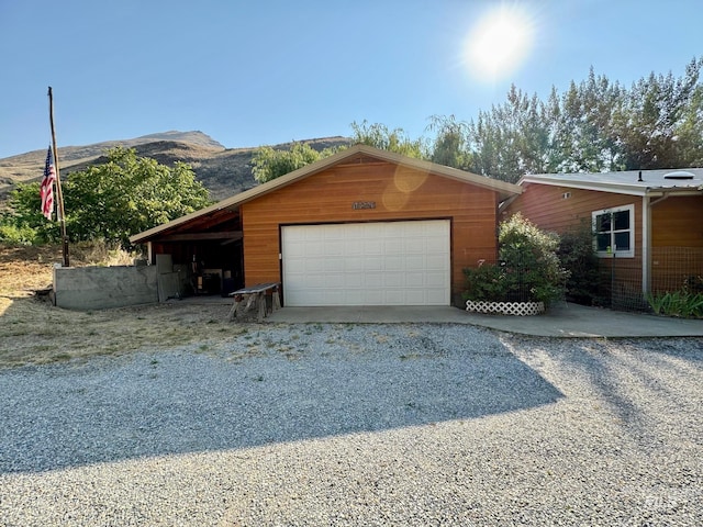 garage featuring a mountain view