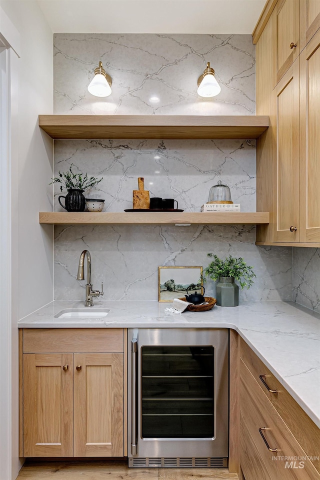 6203 W Estuary St, Eagle, ID 83616 - bar area with wine cooler, a sink, and backsplash