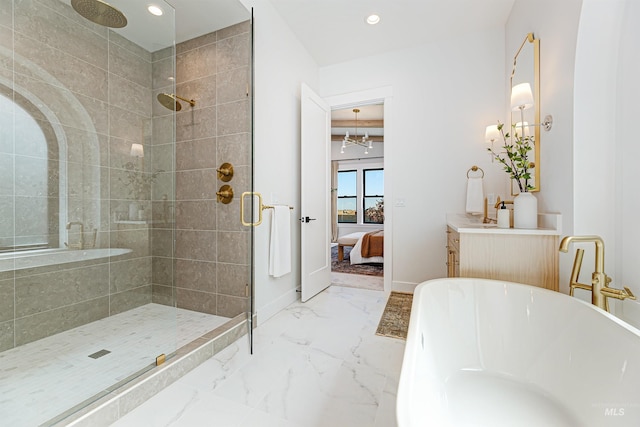 6203 W Estuary St, Eagle, ID 83616 - ensuite bathroom with a stall shower, a freestanding tub, vanity, marble finish flooring, and recessed lighting
