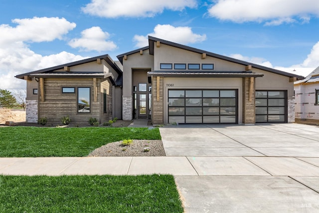 6203 W Estuary St, Eagle, ID 83616 - modern home featuring a garage, driveway, stucco siding, and a front yard