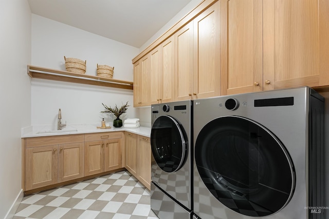 6203 W Estuary St, Eagle, ID 83616 - laundry room featuring cabinet space, separate washer and dryer, and light floors