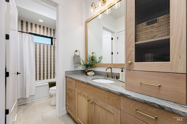 6203 W Estuary St, Eagle, ID 83616 - full bath with toilet, vanity, tile patterned floors, and shower / bath combo