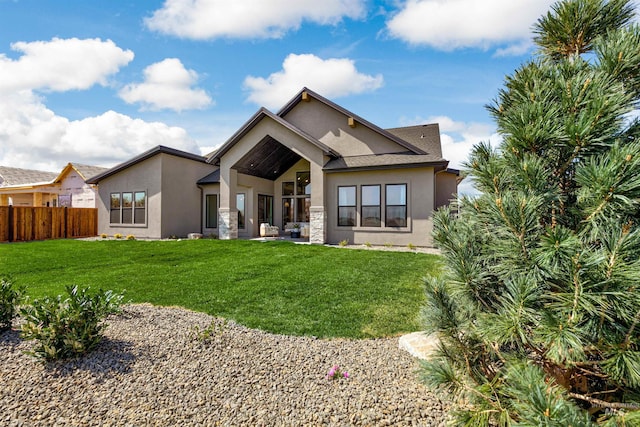 6203 W Estuary St, Eagle, ID 83616 - back of house with stucco siding and stone siding