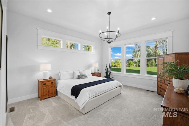 8848 Overunder Ln, Middleton, ID 83644 - bedroom with baseboards, a chandelier, light colored carpet, and recessed lighting
