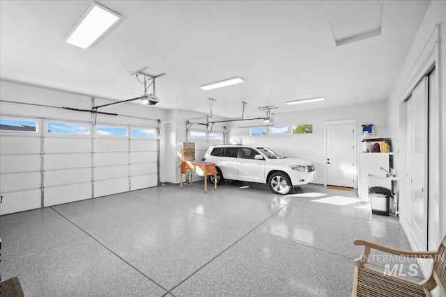 8848 Overunder Ln, Middleton, ID 83644 - garage featuring a garage door opener
