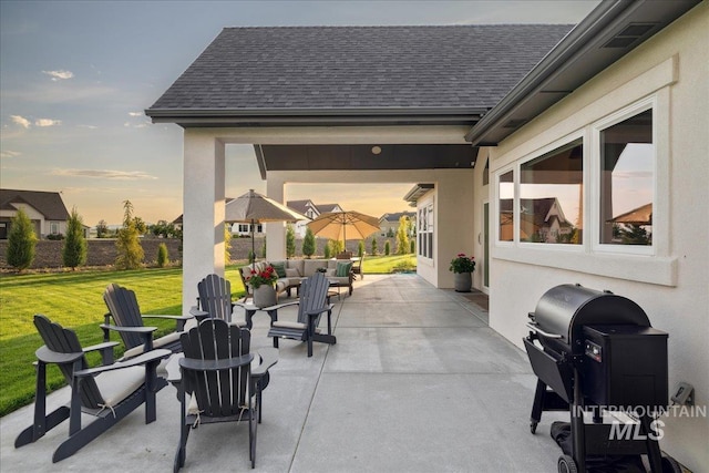8848 Overunder Ln, Middleton, ID 83644 - view of patio with an outdoor living space with a fire pit and area for grilling