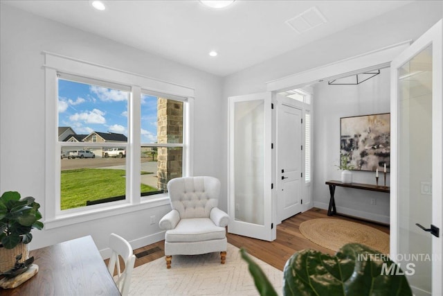 8848 Overunder Ln, Middleton, ID 83644 - sitting room featuring wood finished floors, recessed lighting, and baseboards