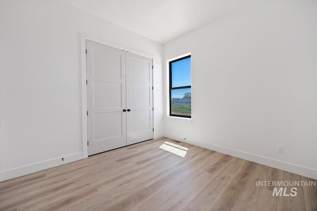 4069N 2200 2200 E E, Filer, ID 83328 - unfurnished bedroom with baseboards and light wood finished floors