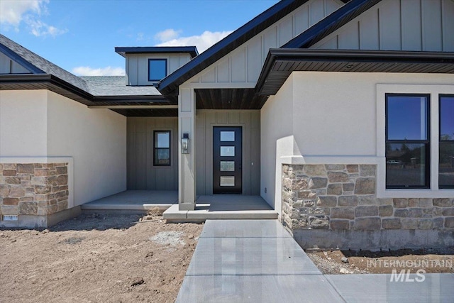 4069N 2200 2200 E E, Filer, ID 83328 - property entrance featuring stone siding and board and batten siding