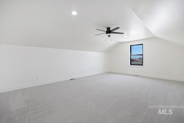 4069N 2200 2200 E E, Filer, ID 83328 - additional living space featuring vaulted ceiling, ceiling fan, baseboards, light colored carpet, and recessed lighting