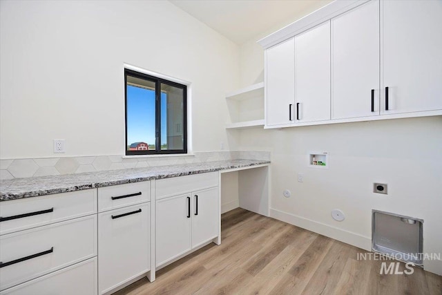 4069N 2200 2200 E E, Filer, ID 83328 - laundry area with hookup for a gas dryer, hookup for an electric dryer, light wood finished floors, cabinet space, and hookup for a washing machine