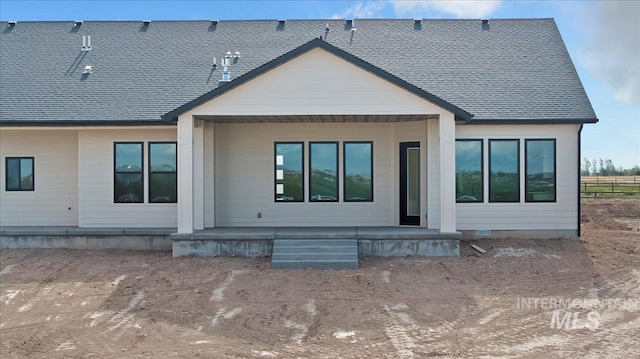 4069N 2200 2200 E E, Filer, ID 83328 - back of property featuring a porch and roof with shingles