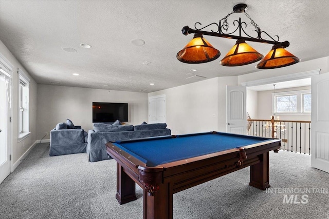 rec room featuring carpet, pool table, and a textured ceiling