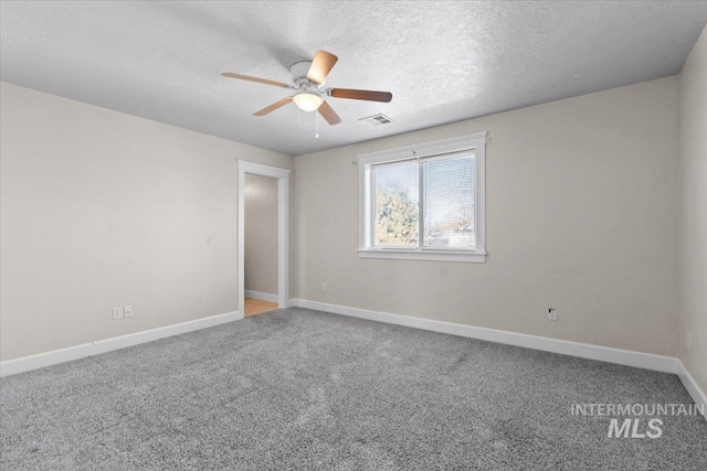 unfurnished room with carpet, a textured ceiling, and ceiling fan