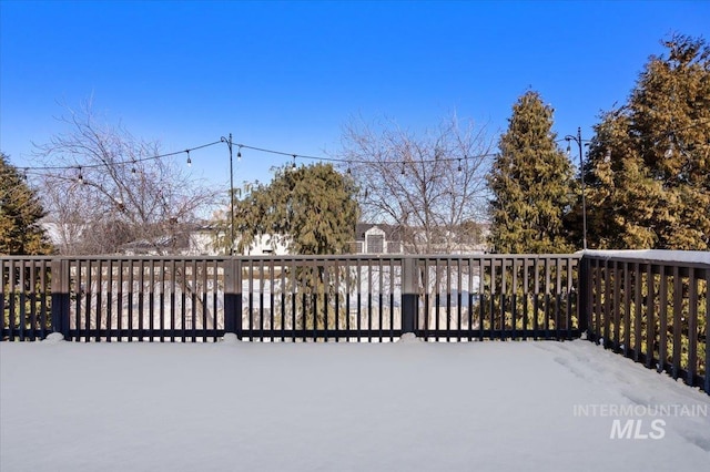 view of snow covered deck