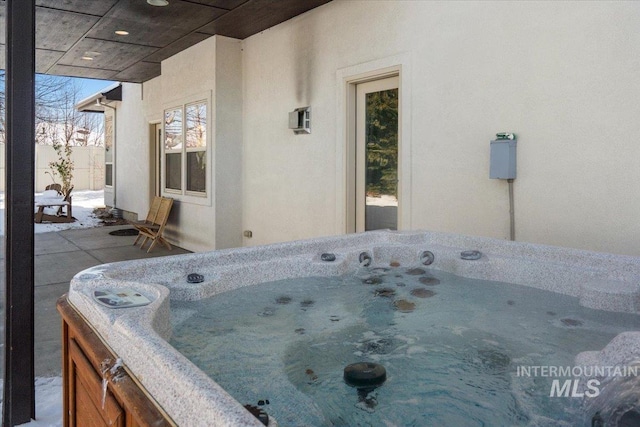 view of patio featuring a hot tub