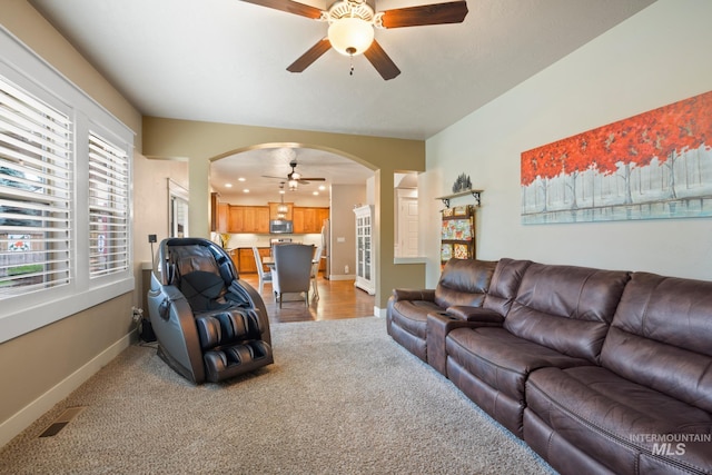 9462 W Whitecrest, Star, ID 83669 - living area featuring a ceiling fan, arched walkways, recessed lighting, and light carpet