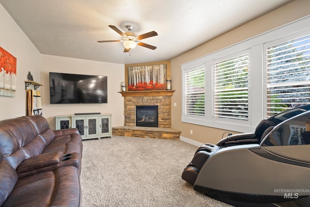9462 W Whitecrest, Star, ID 83669 - carpeted living room with a ceiling fan and a fireplace