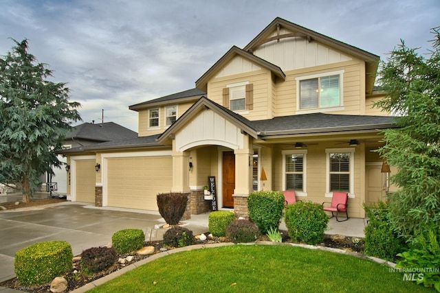 9462 W Whitecrest, Star, ID 83669 - craftsman-style home with board and batten siding, concrete driveway, a front lawn, and a shingled roof