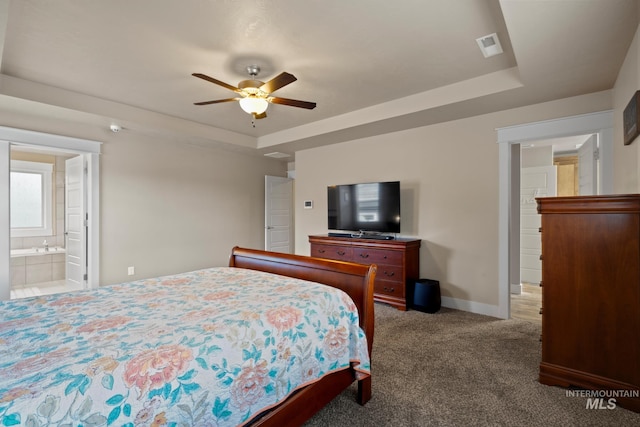 9462 W Whitecrest, Star, ID 83669 - bedroom featuring a tray ceiling, carpet, ceiling fan, and ensuite bath