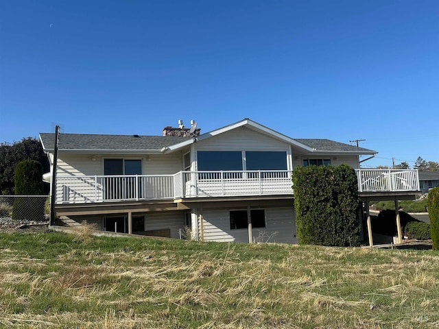 rear view of house with a deck