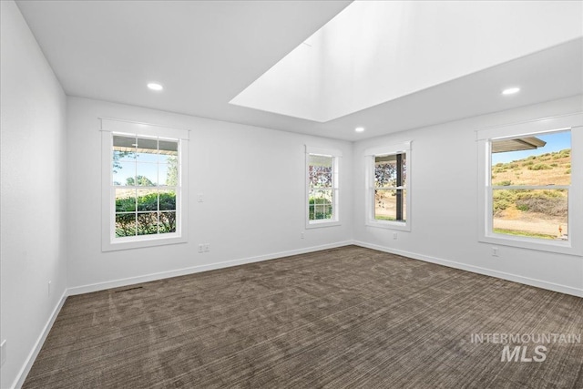 1006 Hill Rd, Homedale, ID 83628 - spare room featuring dark colored carpet and recessed lighting