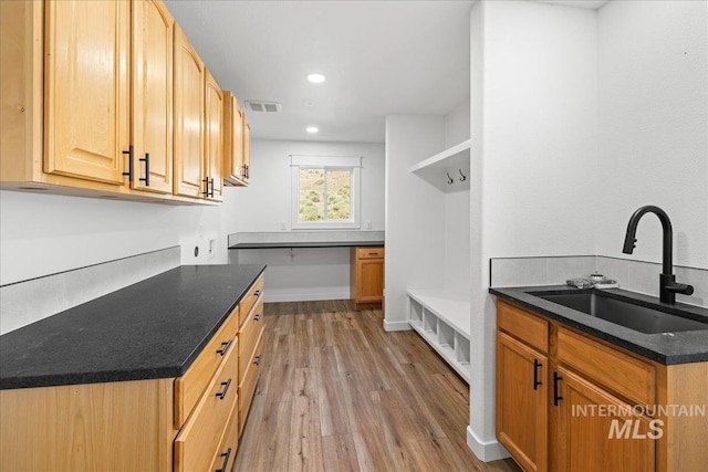 1006 Hill Rd, Homedale, ID 83628 - kitchen featuring light wood-style flooring, recessed lighting, and dark stone counters