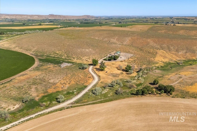 1006 Hill Rd, Homedale, ID 83628 - aerial overview of property's location with rural landscape and a mountainous background