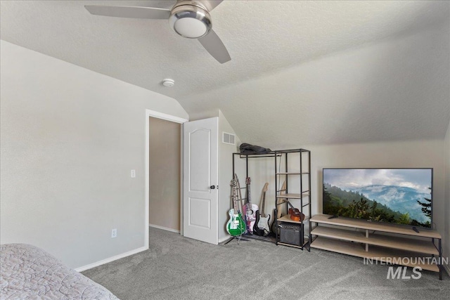 583 E Willowridge Ct, Kuna, ID 83634 - carpeted bedroom with lofted ceiling, a textured ceiling, ceiling fan, and baseboards