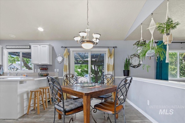 583 E Willowridge Ct, Kuna, ID 83634 - dining area featuring a chandelier