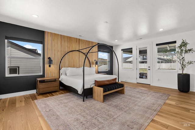 13684 N Sage Grouse Pl, Boise, ID 83714 - bedroom with recessed lighting, wood finished floors, baseboards, and access to outside
