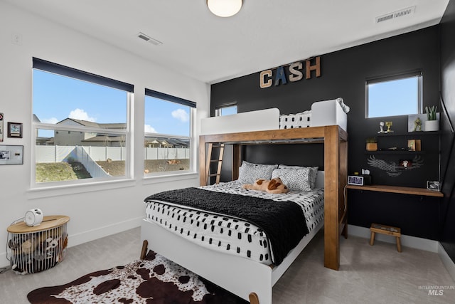 13684 N Sage Grouse Pl, Boise, ID 83714 - bedroom with carpet flooring, baseboards, and visible vents