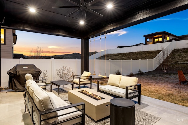 13684 N Sage Grouse Pl, Boise, ID 83714 - view of patio with a fenced backyard, a grill, an outdoor living space with a fire pit, and ceiling fan